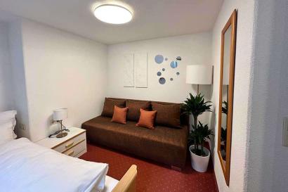 10_pension_schollberg-st-anton-Apartment_Ssportlich-schlafzimmer.jpg